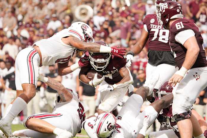 Oct 28, 2023; College Station, Texas, USA; Texas A&M Aggies running back Amari Daniels (4) runs the ball against the South Carolina Gamecocks during the second half at Kyle Field.